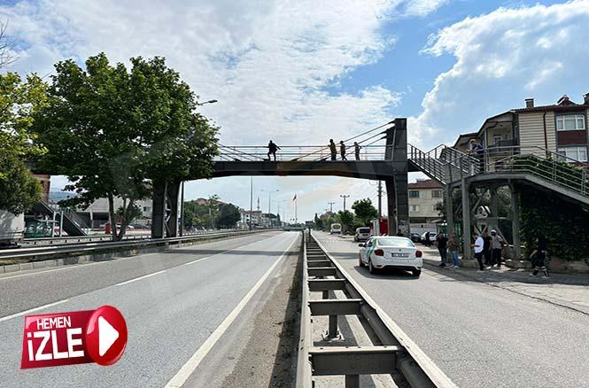 Üst geçittin korkuluklarına çıkan şahıs yürekleri ağızlara getirdi..